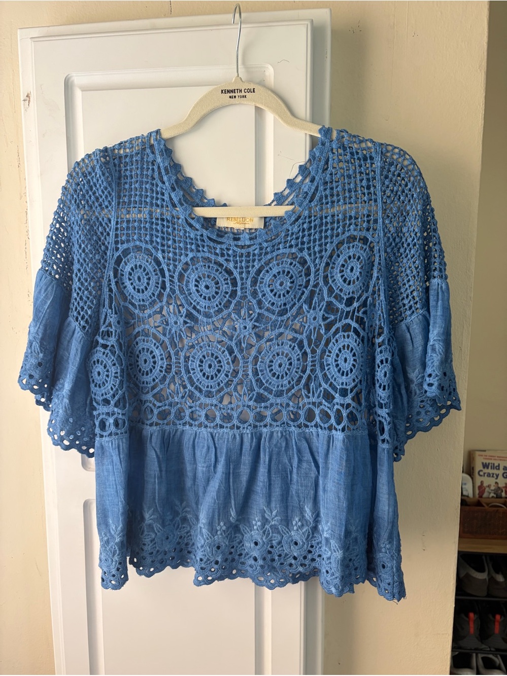 REBELLION Blue slightly cropped top. Size M